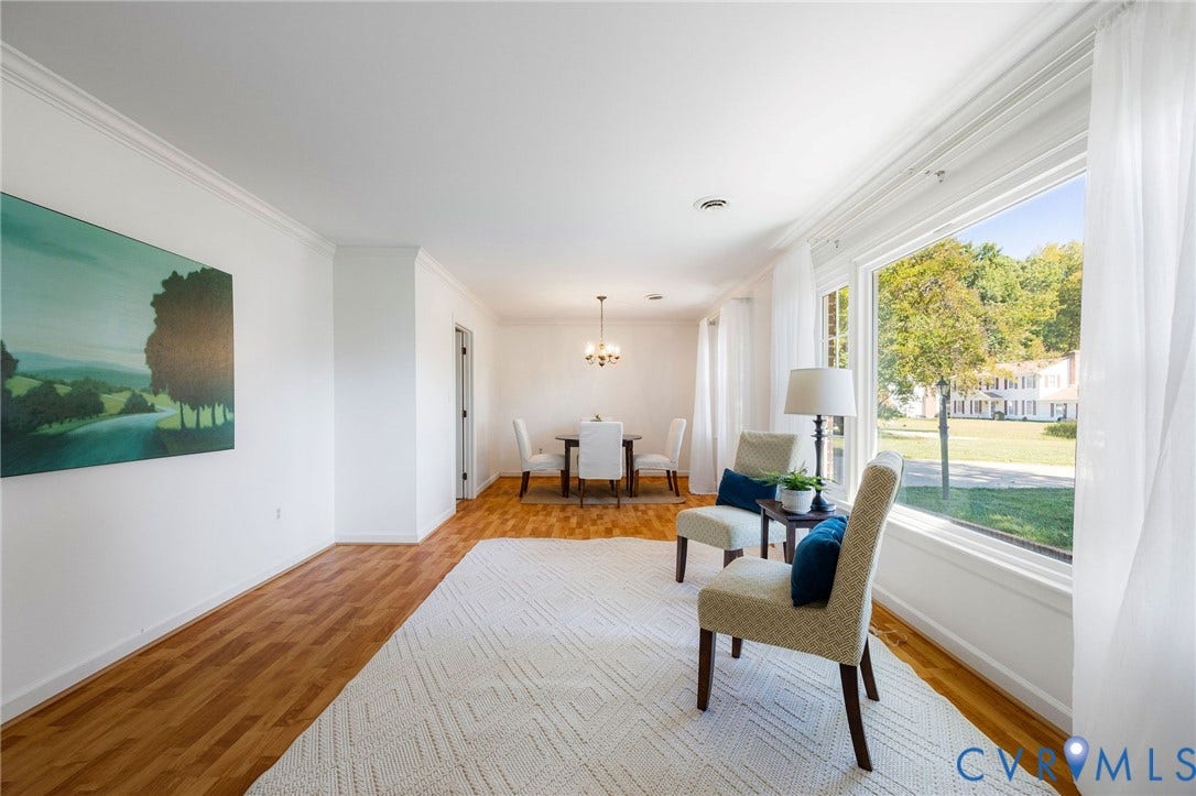 3356 Seaton Road, Petersburg, VA 23805 Bright interior with wood-finish flooring, crown molding, and large windows