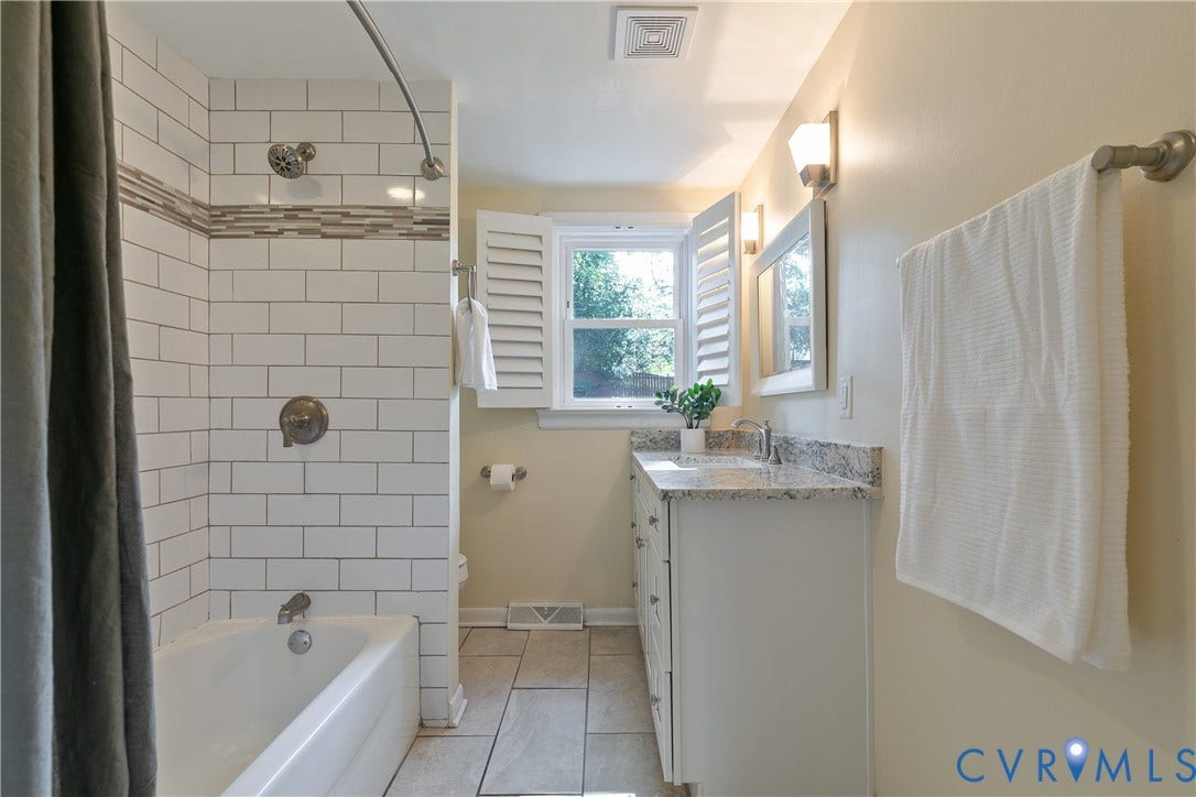 4327 Wakefield Road, Stratford Hills, Richmond, VA 23235 Bathtub with subway tile surround, mosaic accent tile, and a shower head