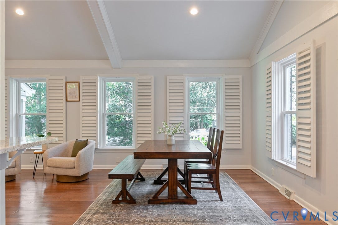 4327 Wakefield Road, Stratford Hills, Richmond, VA 23235 Wood-finish flooring, white plantation shutters, vaulted ceiling with exposed beams, and recessed lighting