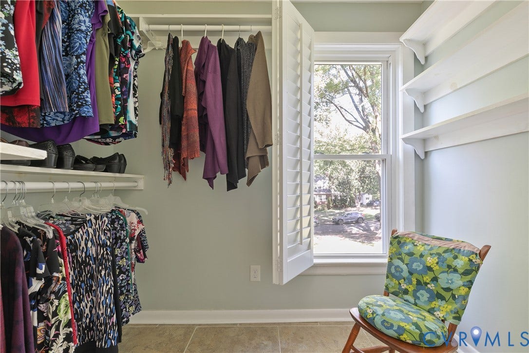 4327 Wakefield Road, Stratford Hills, Richmond, VA 23235 Custom closet organization system, multiple shelving units, plantation shutters, large window, and tile flooring