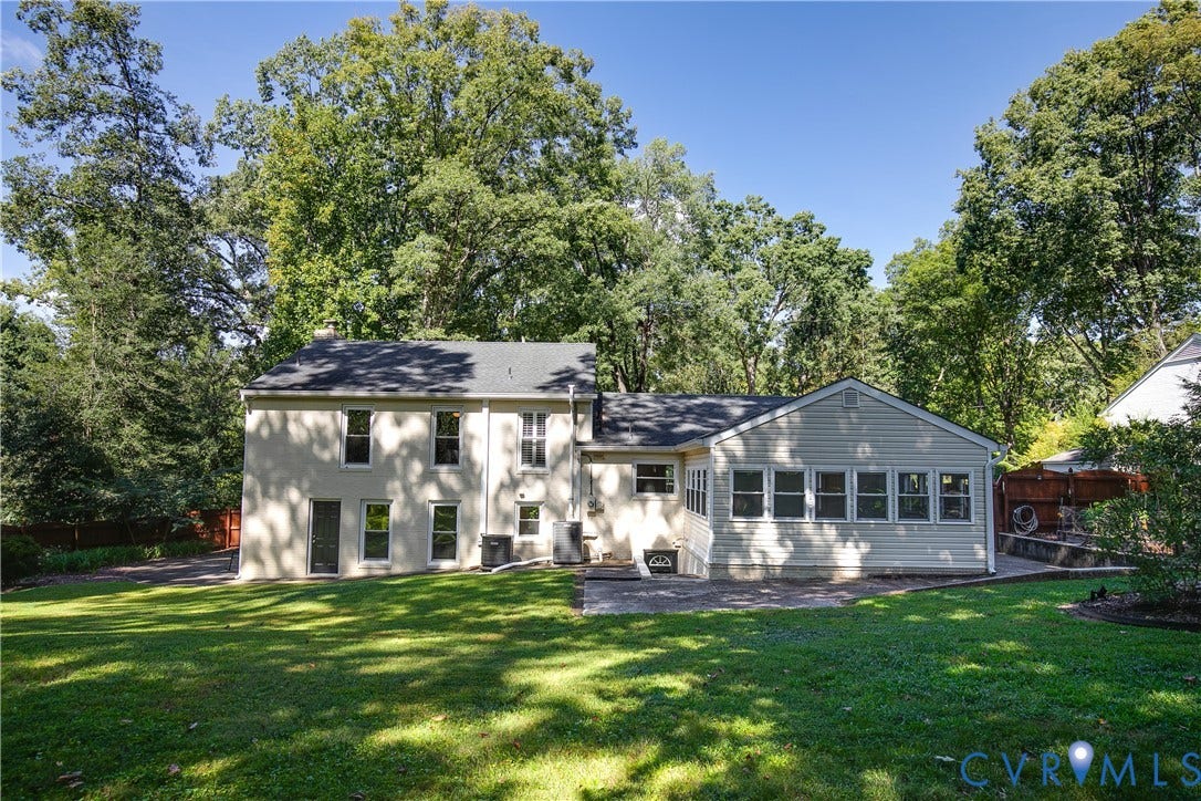 4327 Wakefield Road, Stratford Hills, Richmond, VA 23235 Expansive rear yard with a manicured lawn, established landscaping, and a patio area