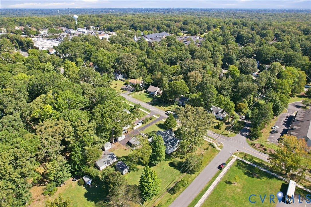2406 McRae Road, Richmond, VA 23235 Enjoy a wooded setting close to sidewalks, recreation, and Bon Air Elementary School.