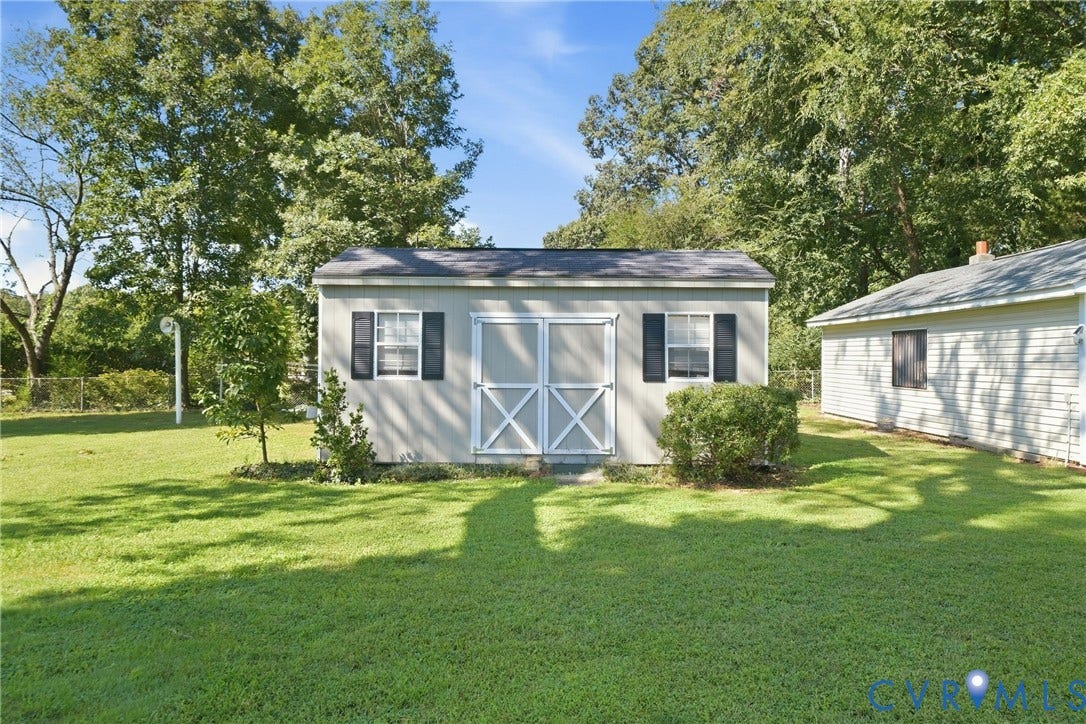 2406 McRae Road, Richmond, VA 23235 Two additional sheds provide convenient storage for lawn and outdoor equipment.