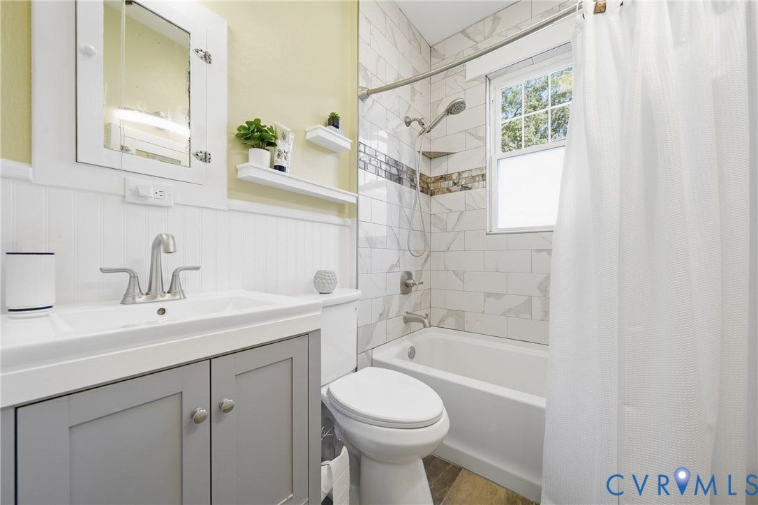 2406 McRae Road, Richmond, VA 23235 An updated second bathroom adds comfort and convenience to the homes main-level layout.