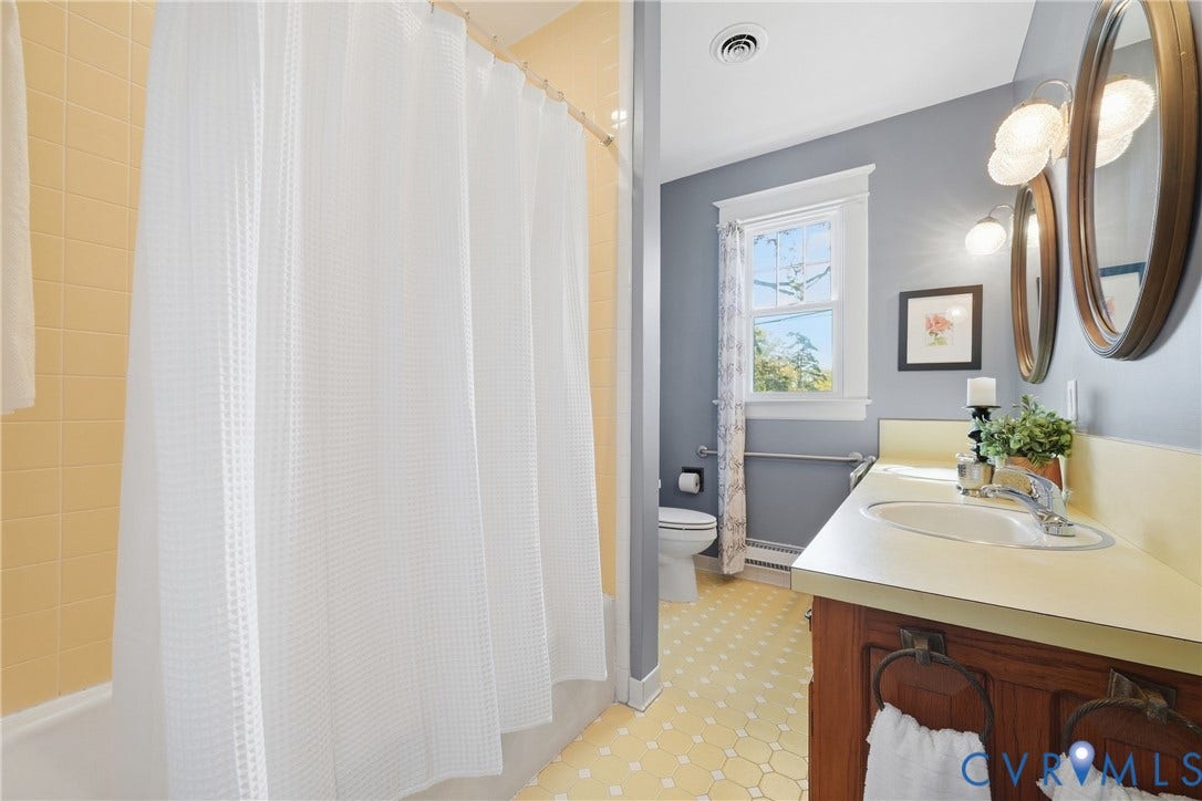 2406 McRae Road, Richmond, VA 23235 The first of two full bathrooms on the first floor.