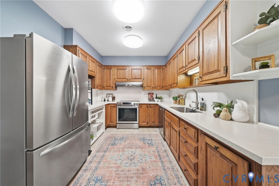 2406 McRae Road, Richmond, VA 23235 Kitchen with generous cabinetry keeps everyday essentials organized and within easy reach.