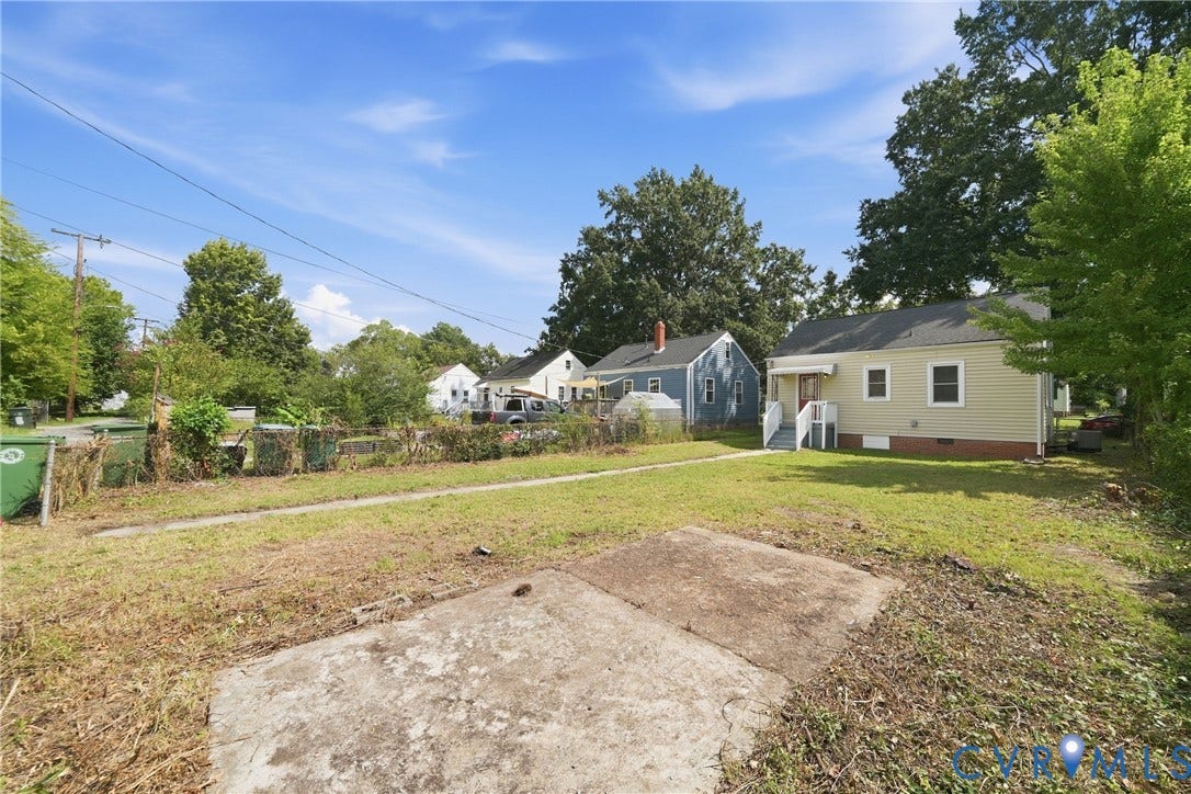 1718 Rogers, Richmond, VA 23223 Siding exterior with a covered entry and a concrete porch