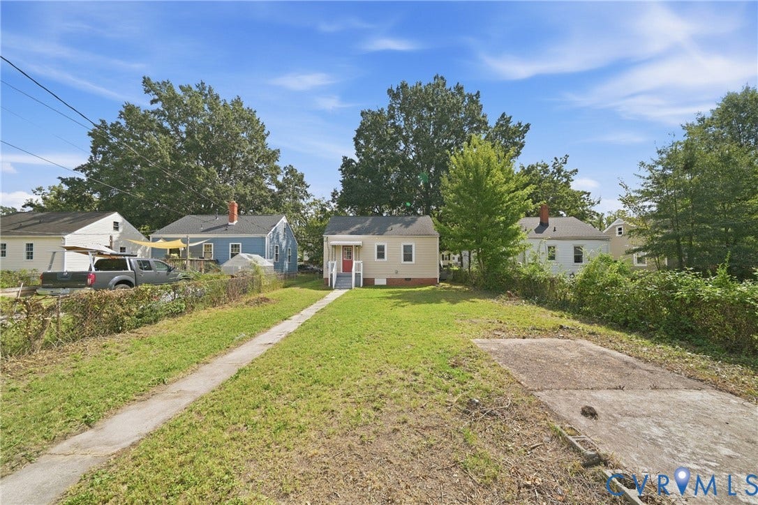 1718 Rogers, Richmond, VA 23223 Property with a paved walkway, established lawn, and mature trees