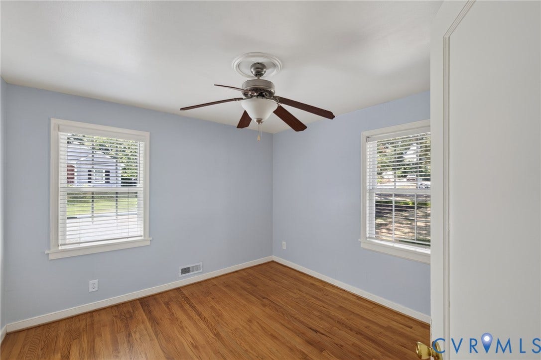 8415 Holly Hill Road, Henrico, VA 23229 Wood-finish flooring, two window openings, ceiling fan, and crown molding