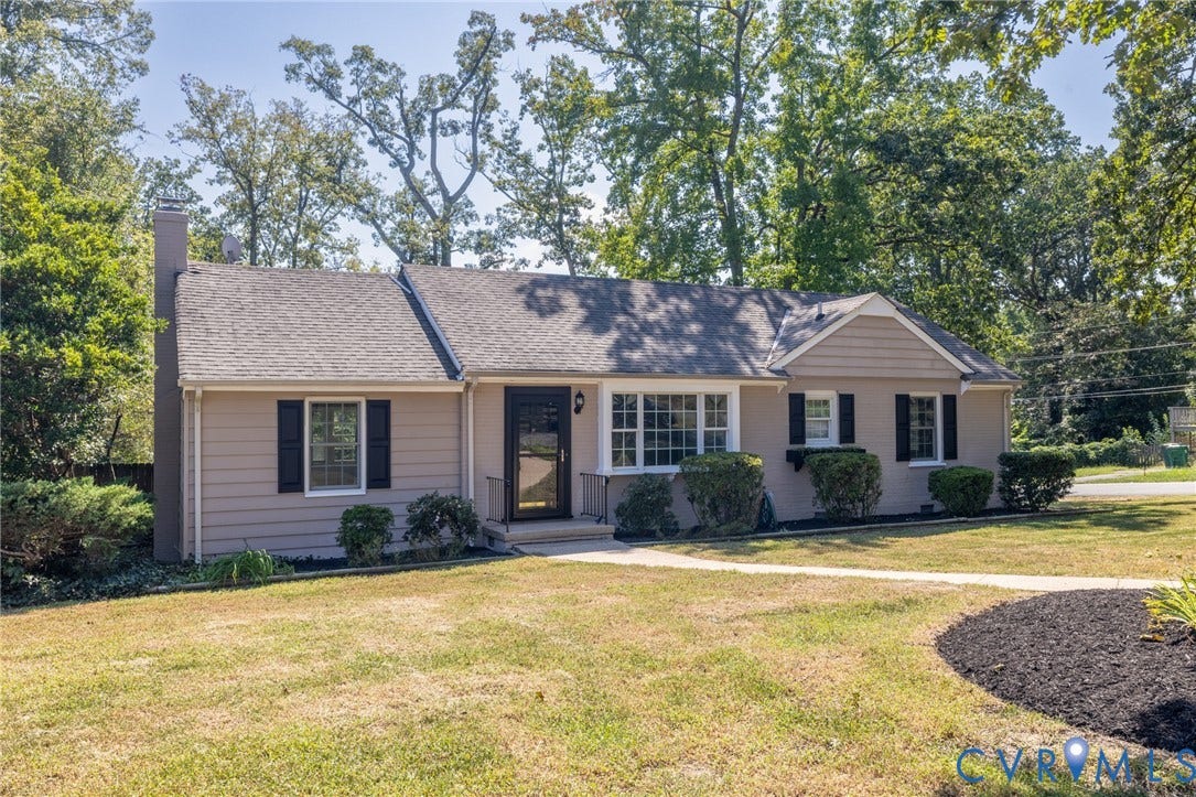 8415 Holly Hill Road, Henrico, VA 23229 Single-story residence featuring light-colored siding and a dark shingle roof
