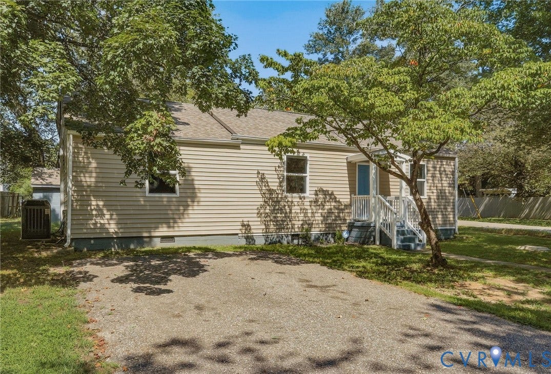 Vinyl siding exterior with a pitched roof