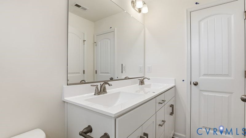 2417 Flora Boulevard, Townes At Arcadia, Henrico, VA 23231 This photo shows a similar floorplan and quality level to Eastwood Homes. Actual design selections and layout may vary.