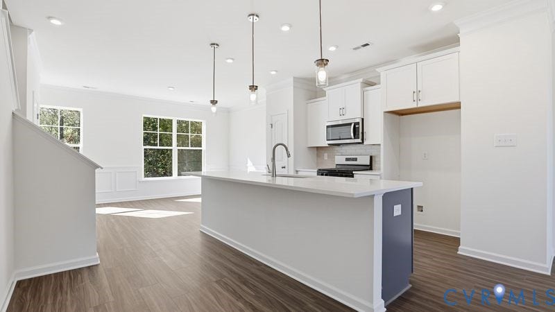 2417 Flora Boulevard, Townes At Arcadia, Henrico, VA 23231 This photo shows a similar floorplan and quality level to Eastwood Homes. Actual design selections and layout may vary.