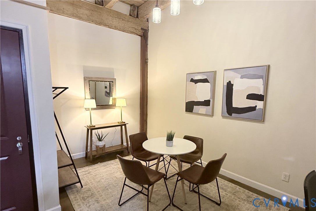 815 Porter Street, #U106, Manchester, Richmond, VA 23224 Dedicated dining area with exposed wood beams.