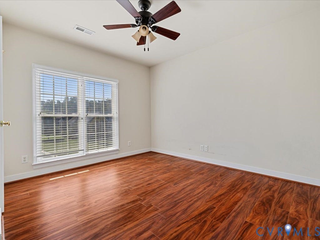 Bedroom 3, front of house on right