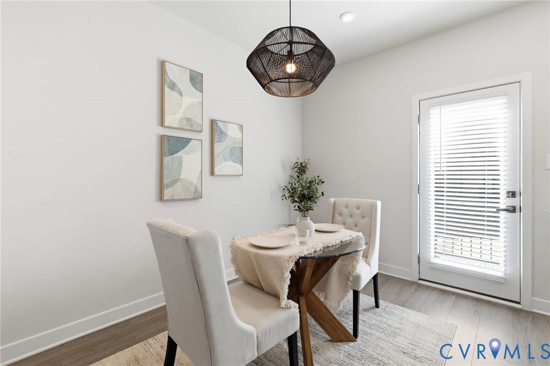 Wood-finish flooring with crisp white baseboards