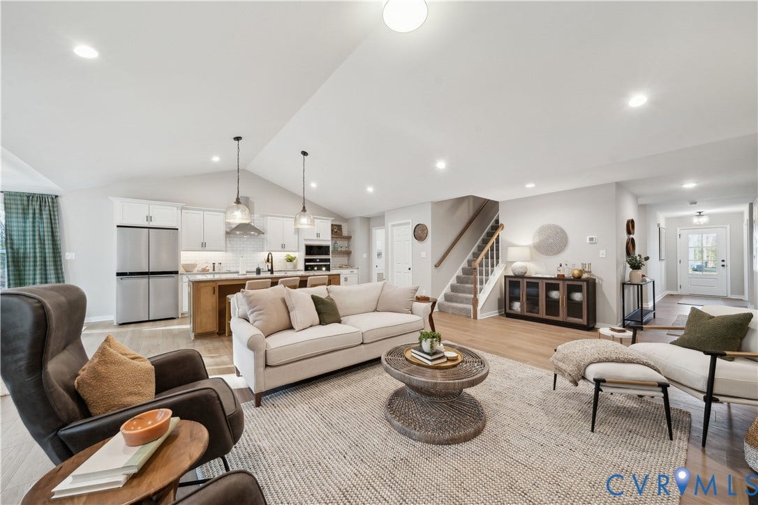 535 Wendenburg Terrace, #MODEL, Kennington, Aylett, VA 23009 Expansive open-concept living area featuring vaulted ceilings, recessed lighting, and wood-finish flooring