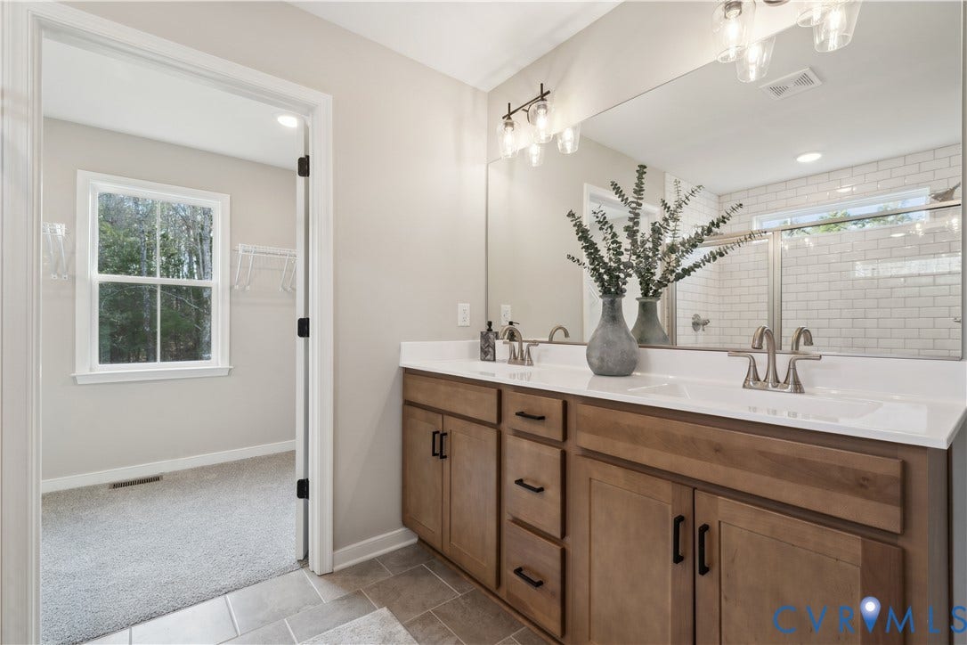 535 Wendenburg Terrace, #MODEL, Kennington, Aylett, VA 23009 Dual vanity with wood-finish cabinetry, white countertops, and integrated sinks