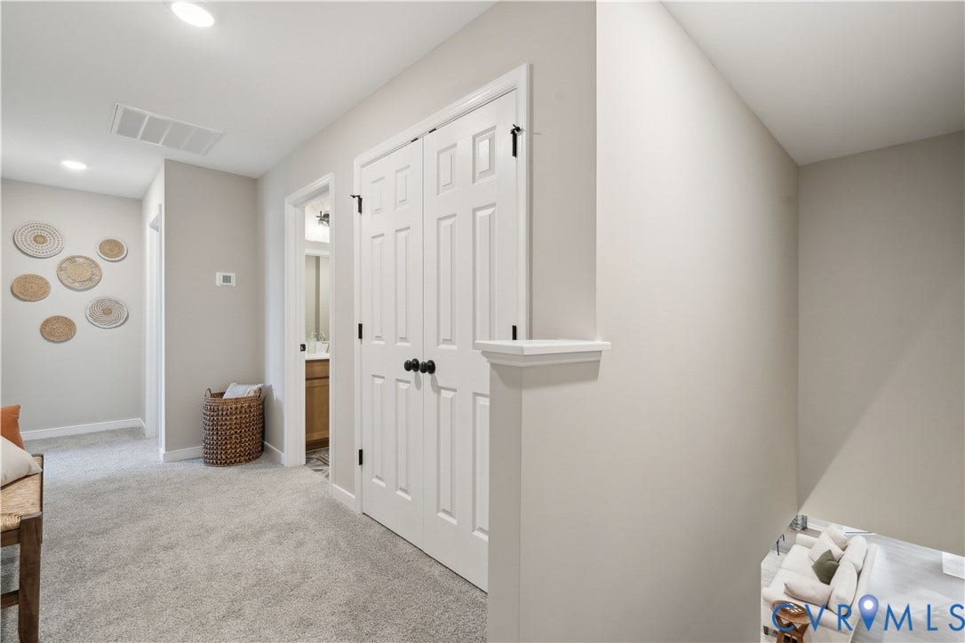 535 Wendenburg Terrace, #MODEL, Kennington, Aylett, VA 23009 Recessed ceiling lighting, light gray wall paint, light-colored carpet flooring, white paneled doors, and black door hardware