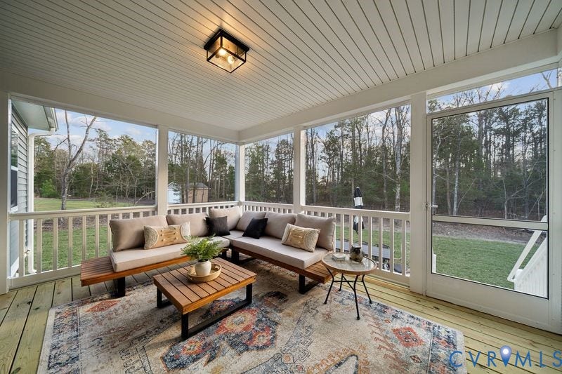 535 Wendenburg Terrace, #MODEL, Kennington, Aylett, VA 23009 Screened porch featuring a beadboard ceiling, wood-finish flooring, and a glass-paned light fixture