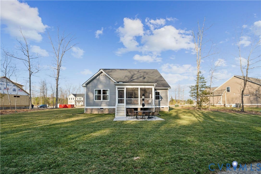 535 Wendenburg Terrace, #MODEL, Kennington, Aylett, VA 23009 Expansive grassy lawn with a screened porch, exterior patio, and dark gray shingle roof
