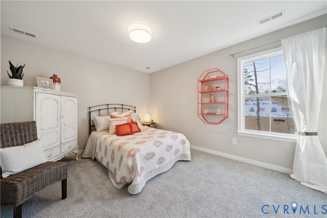 535 Wendenburg Terrace, #MODEL, Kennington, Aylett, VA 23009 Carpeted bedroom with a single window, overhead flush mount lighting, and neutral wall tones