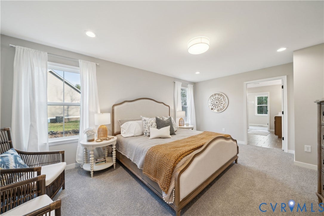 535 Wendenburg Terrace, #MODEL, Kennington, Aylett, VA 23009 Recessed lighting, flush-mount ceiling fixture, grey carpeting, two single-hung windows, and a doorway with white trim