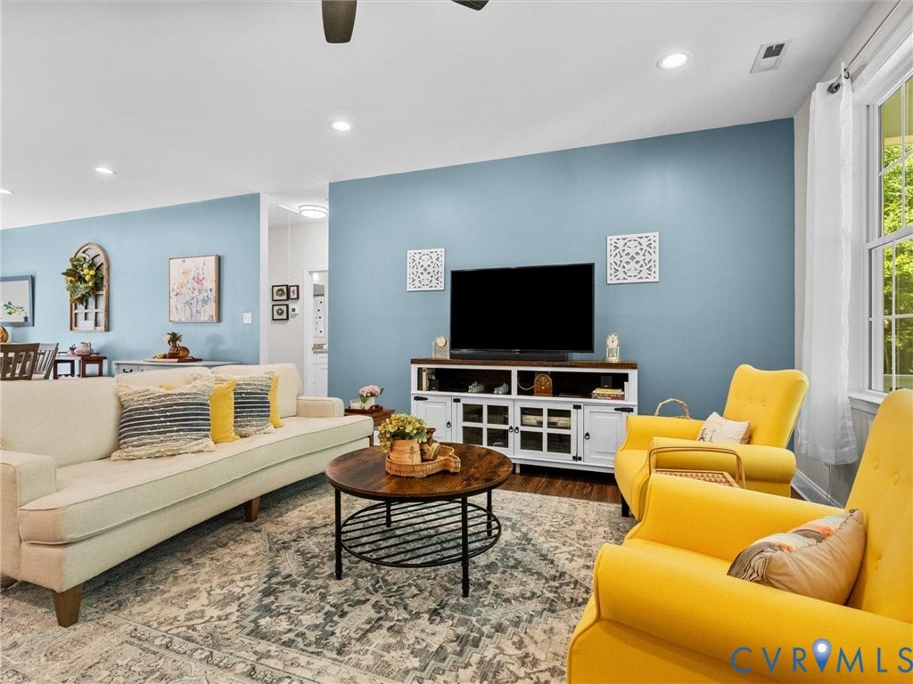 5927 Trenholm Village Drive, Trenholm Village, Powhatan, VA 23139 Recessed ceiling lighting, wood-finish flooring, and a large window with white curtains