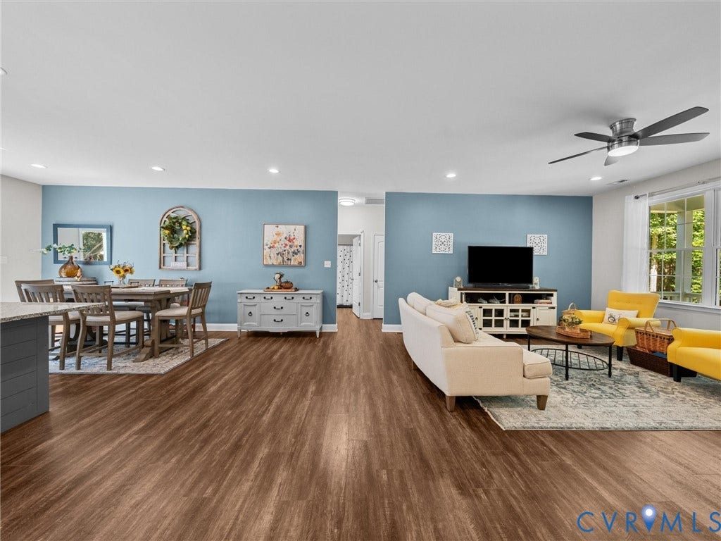 5927 Trenholm Village Drive, Trenholm Village, Powhatan, VA 23139 Wood-finish flooring throughout, recessed ceiling lighting, a modern ceiling fan, and large windows with exterior views
