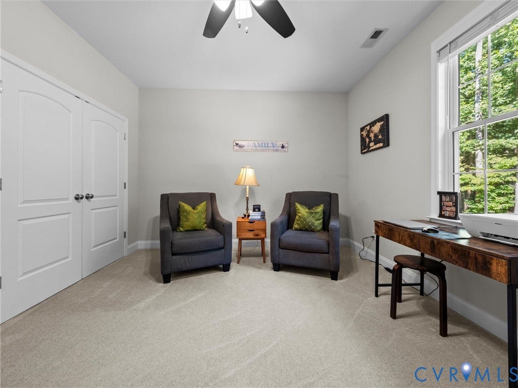 5927 Trenholm Village Drive, Trenholm Village, Powhatan, VA 23139 Arched panel closet doors, ceiling fan, carpet flooring, and a large window
