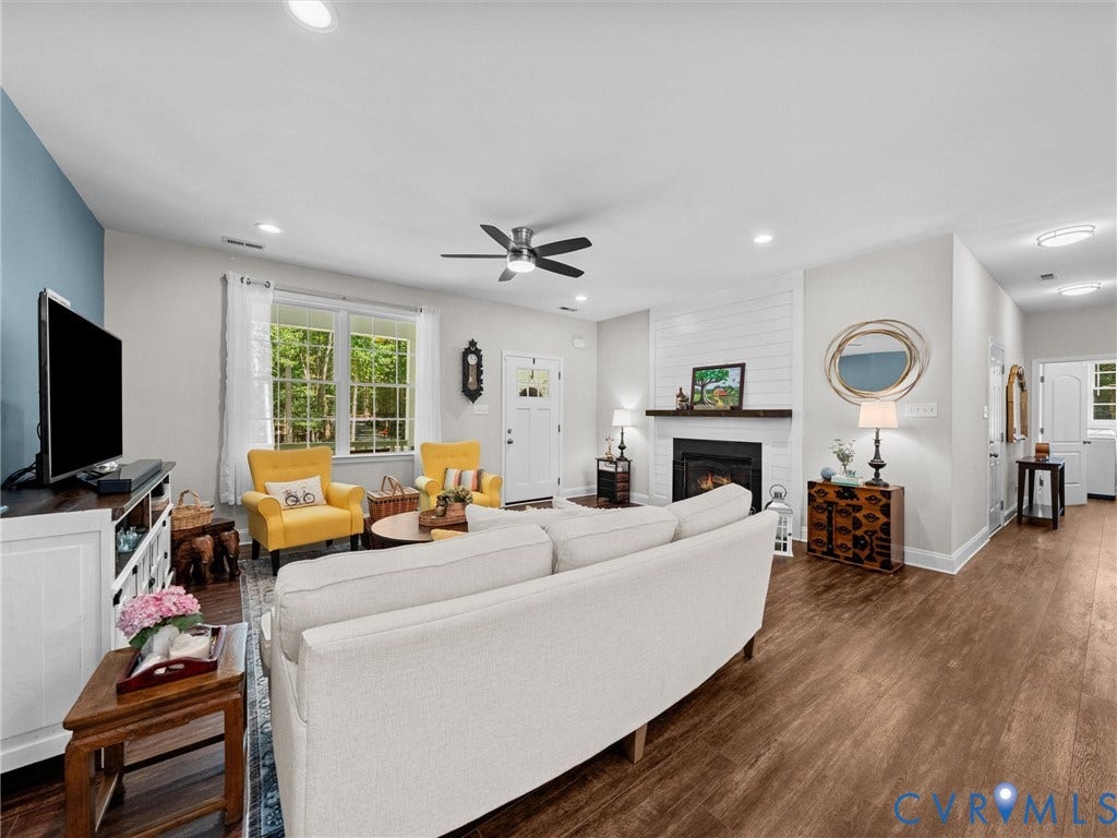 5927 Trenholm Village Drive, Trenholm Village, Powhatan, VA 23139 Spacious living area featuring wood-finish flooring, recessed lighting, and a ceiling fan