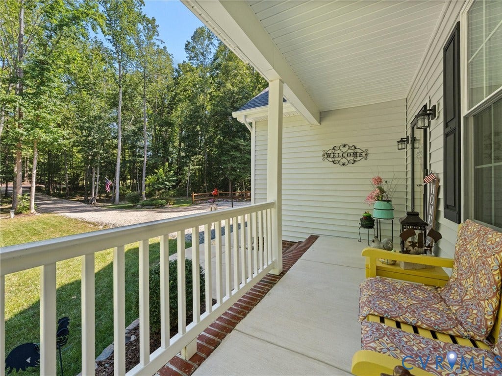 5927 Trenholm Village Drive, Trenholm Village, Powhatan, VA 23139 Expansive front porch featuring concrete flooring and white railing