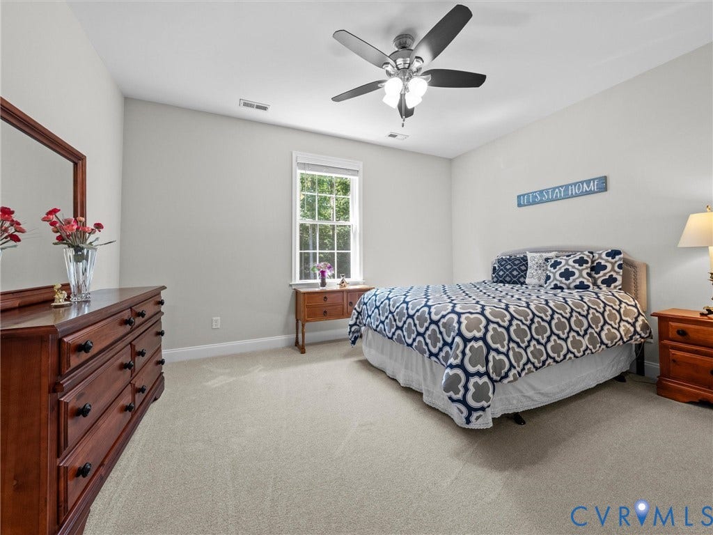 5927 Trenholm Village Drive, Trenholm Village, Powhatan, VA 23139 Neutral tone wall paint, light-colored carpeting, window with natural light, ceiling fan with integrated lighting, recessed lighting