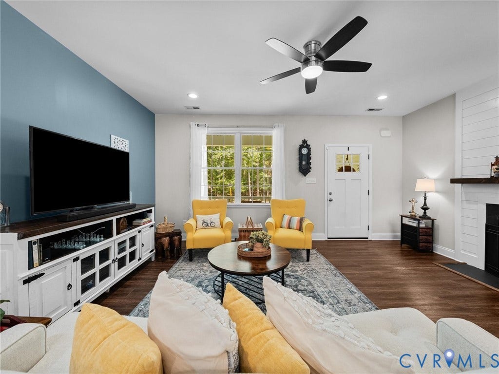 5927 Trenholm Village Drive, Trenholm Village, Powhatan, VA 23139 Recessed lighting, wood-finish flooring, ceiling fan, fireplace with shiplap accent, and a paneled entry door with glass inserts