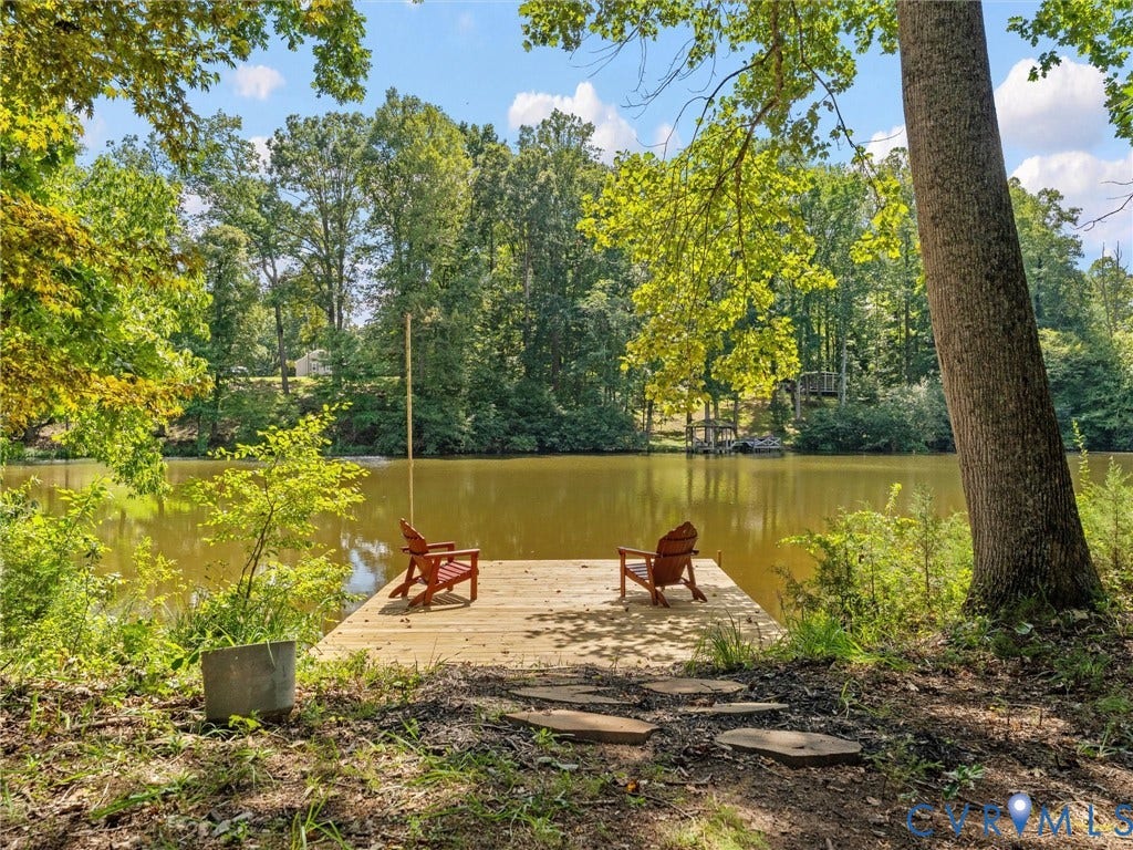 2135 Lakeview Drive, Lake Shawnee, Powhatan, VA 23139 Private lake access with a wooden dock and lush surrounding trees
