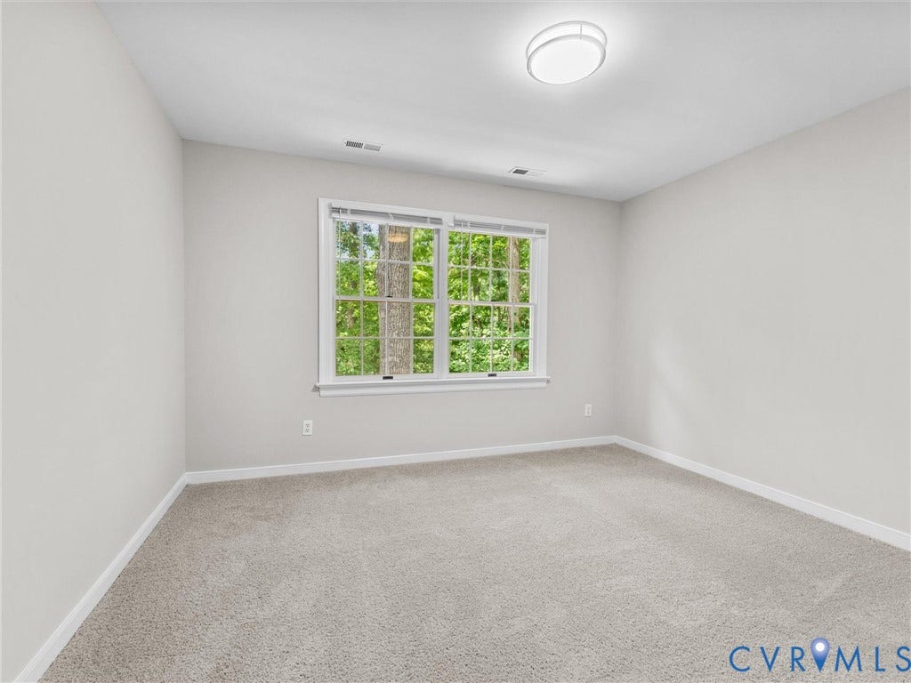 3700 Bremerton Drive, Wellesley, Henrico, VA 23233 Neutral tone walls, light grey carpeting, white trim, recessed lighting, and a double-paned window
