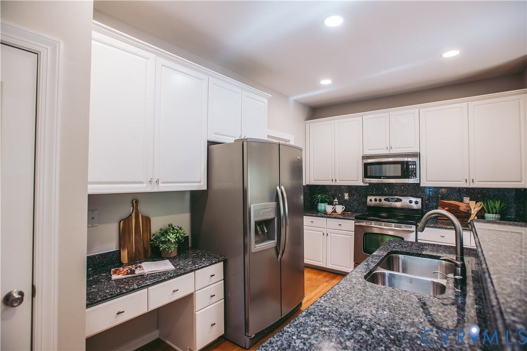3700 Bremerton Drive, Wellesley, Henrico, VA 23233 Stainless steel appliances, white cabinetry, dark stone countertops, wood-finish flooring, and recessed ceiling lighting