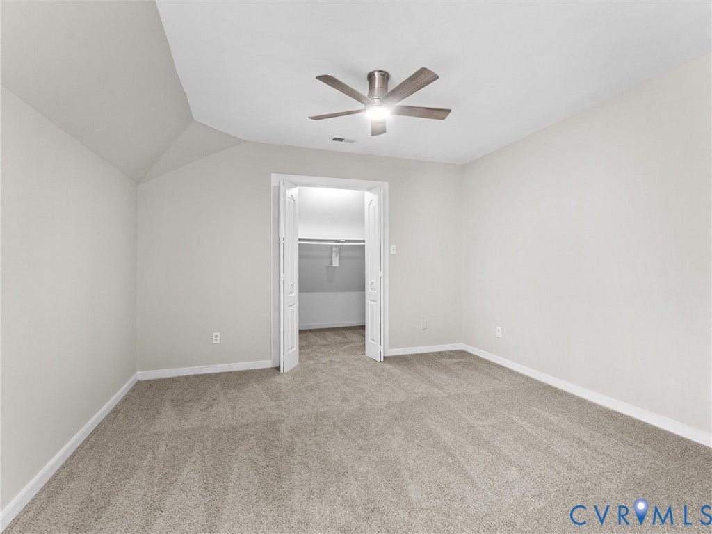3700 Bremerton Drive, Wellesley, Henrico, VA 23233 Plush carpeting, neutral wall finishes, vaulted ceiling, ceiling fan, and bi-fold closet doors