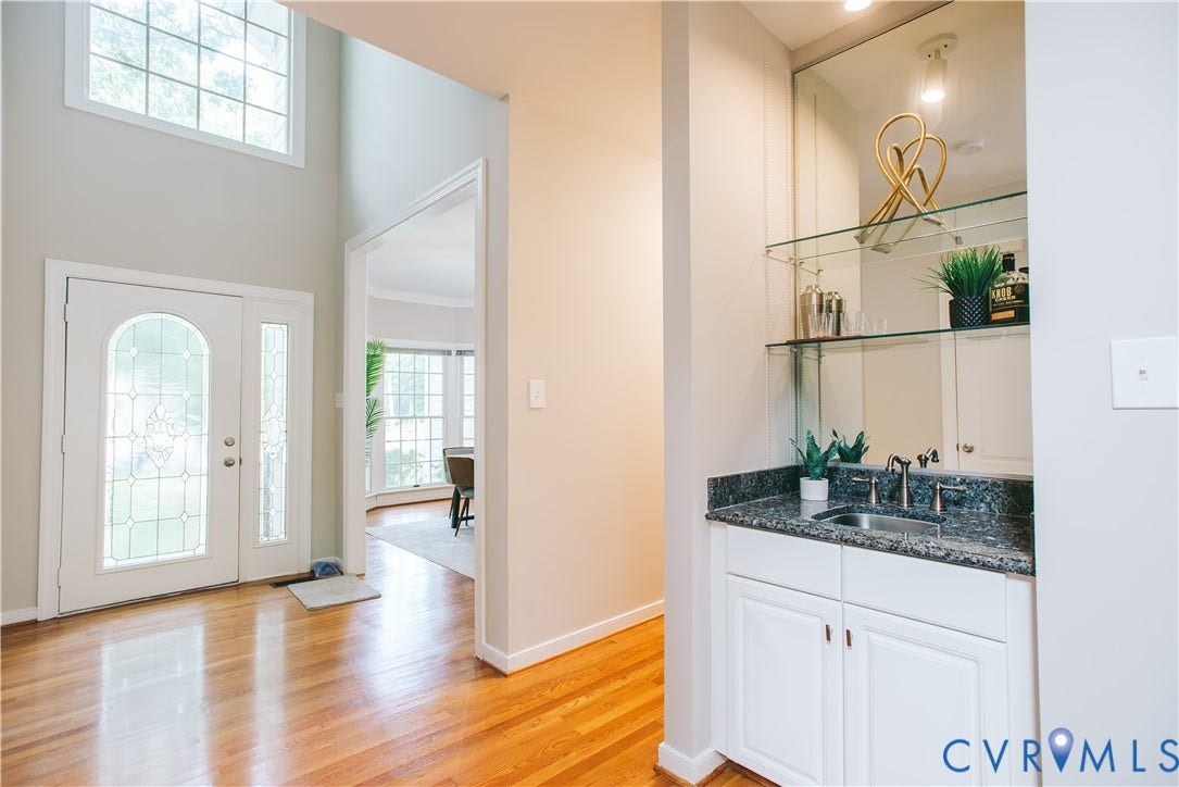 3700 Bremerton Drive, Wellesley, Henrico, VA 23233 Two-story foyer with transom windows and wood-finish flooring