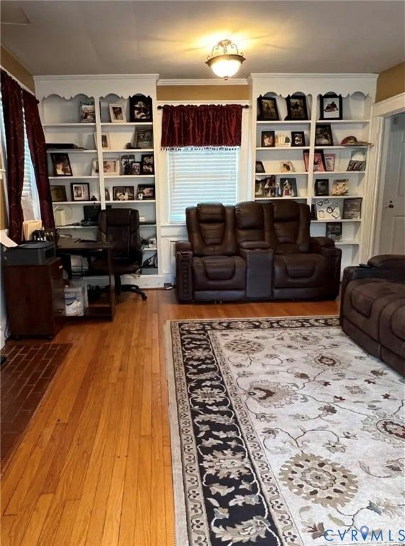 13232 W James Anderson Highway, Courthouse Area, Buckingham, VA 23921 Hardwood flooring throughout, built-in shelving, overhead lighting, and a window with blinds