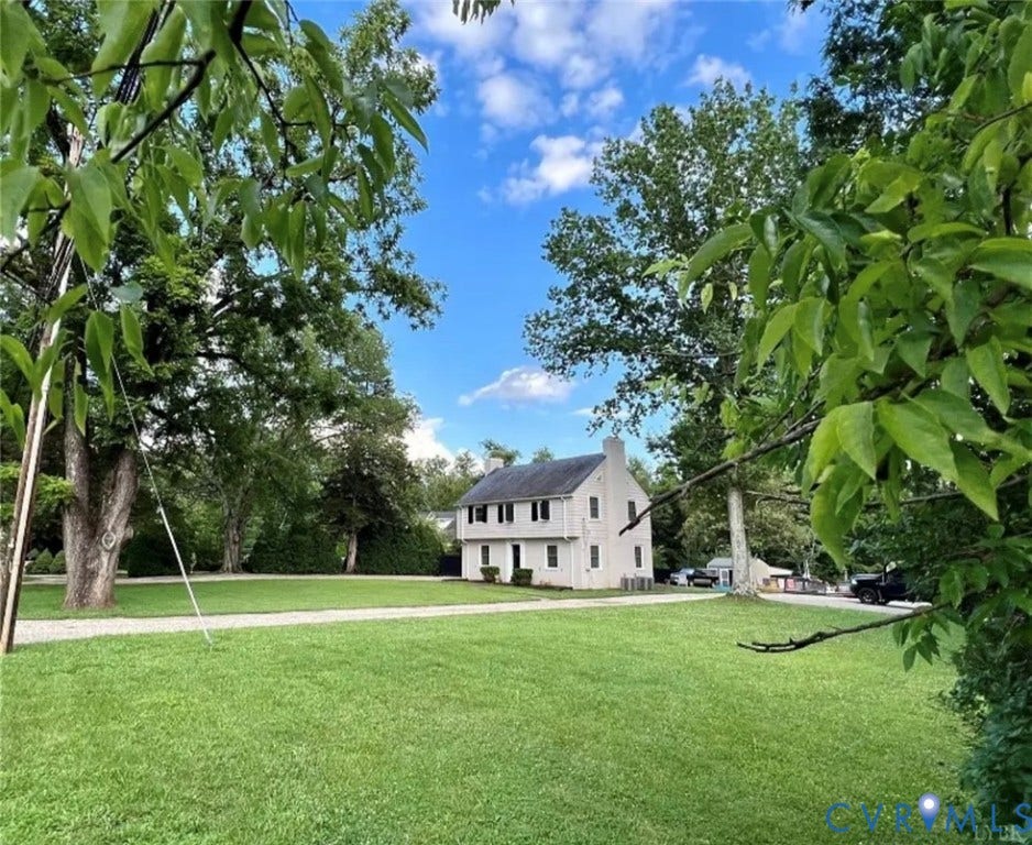13232 W James Anderson Highway, Courthouse Area, Buckingham, VA 23921 Two-story exterior with multiple windows, side chimney, and a dark roof