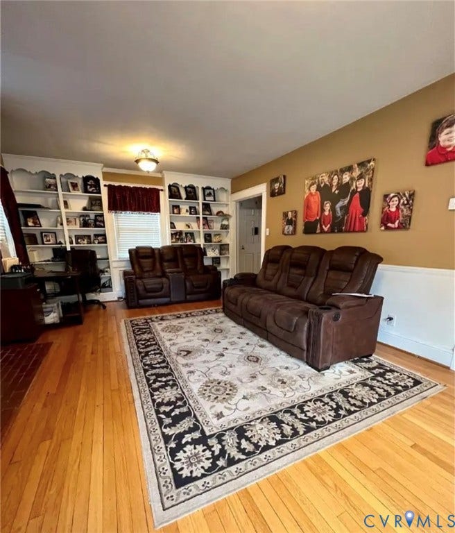 13232 W James Anderson Highway, Courthouse Area, Buckingham, VA 23921 Hardwood flooring throughout, built-in shelving, crown molding, and wainscoting