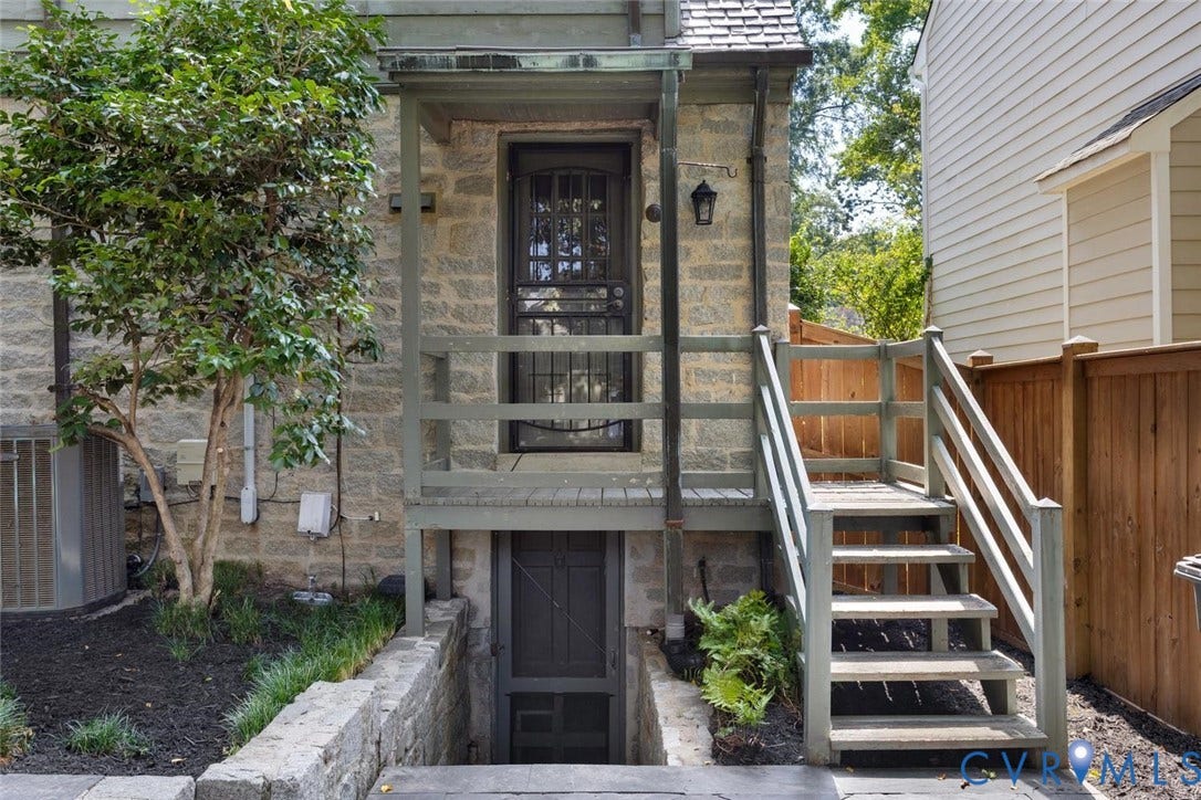 5113 King William Road, Westover Hills, Richmond, VA 23225 Stone exterior with a wooden deck and staircase