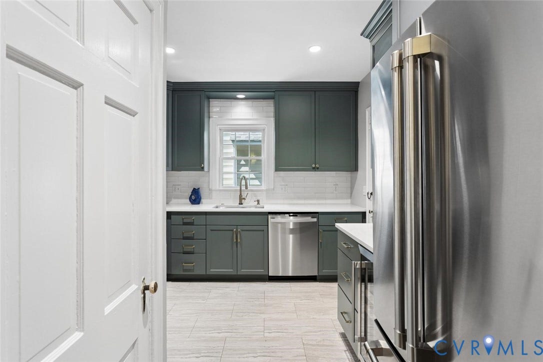 5113 King William Road, Westover Hills, Richmond, VA 23225 Kitchen with dark green cabinetry, white countertops, tile backsplash, and stainless steel appliances