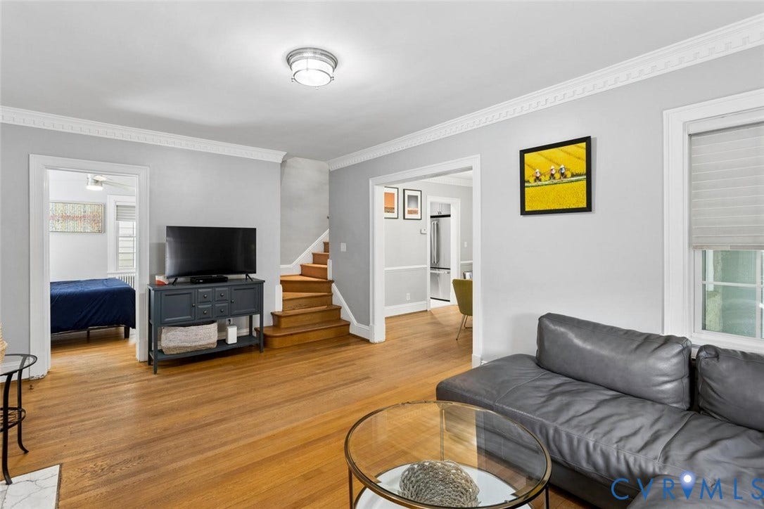 5113 King William Road, Westover Hills, Richmond, VA 23225 Hardwood flooring, crown molding, white trim, recessed lighting, and a visible staircase