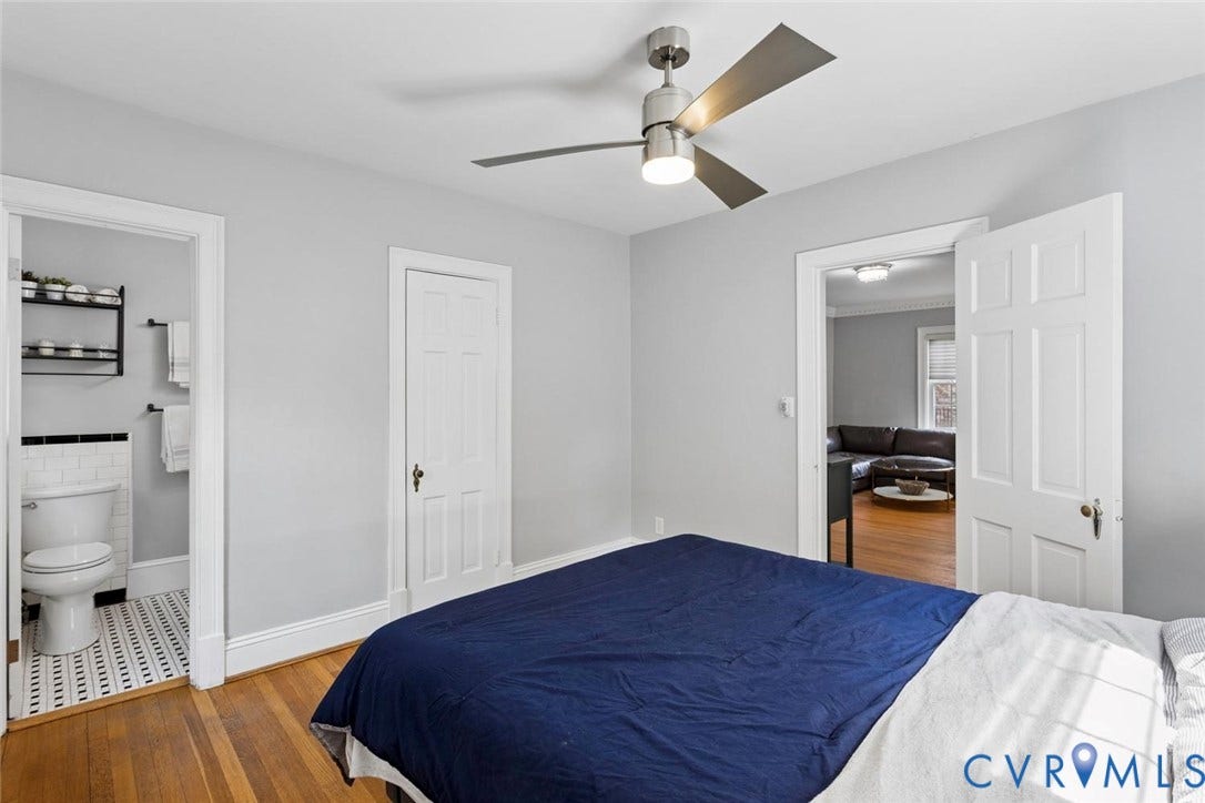 5113 King William Road, Westover Hills, Richmond, VA 23225 Wood-finish flooring, modern ceiling fan with lighting, white interior doors, and light-toned walls