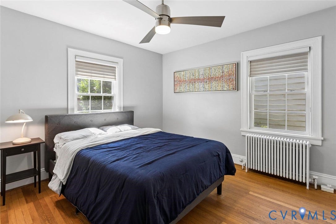 5113 King William Road, Westover Hills, Richmond, VA 23225 Wood-finish flooring, white trim, and a ceiling fan with integrated lighting