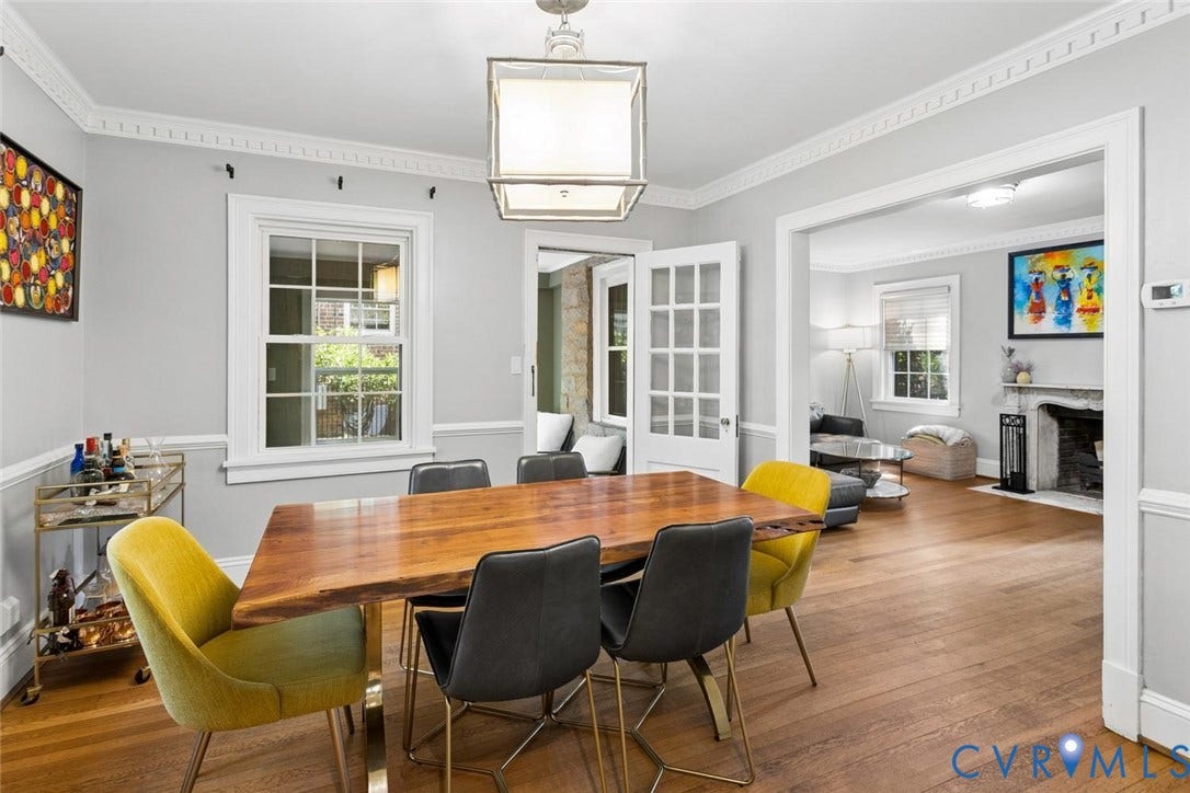 5113 King William Road, Westover Hills, Richmond, VA 23225 Wood-finish flooring, crown molding, chair rail molding, square-frame chandelier, and window with grid muntins