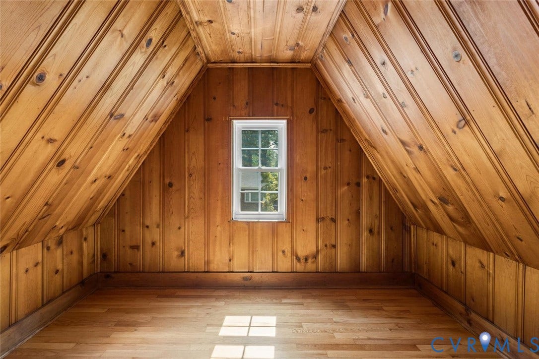 5113 King William Road, Westover Hills, Richmond, VA 23225 Paneled wood walls and ceiling, hardwood flooring, and a single window