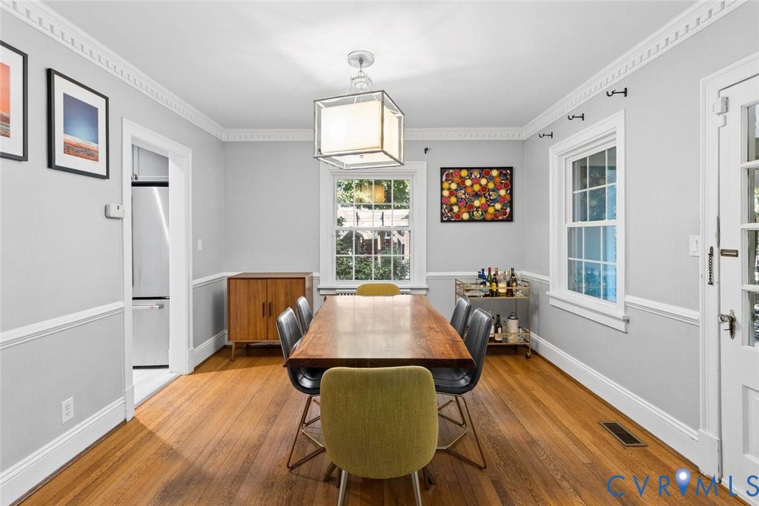 5113 King William Road, Westover Hills, Richmond, VA 23225 Hardwood flooring, crown molding, double-hung windows, and a built-in refrigerator in an adjoining space